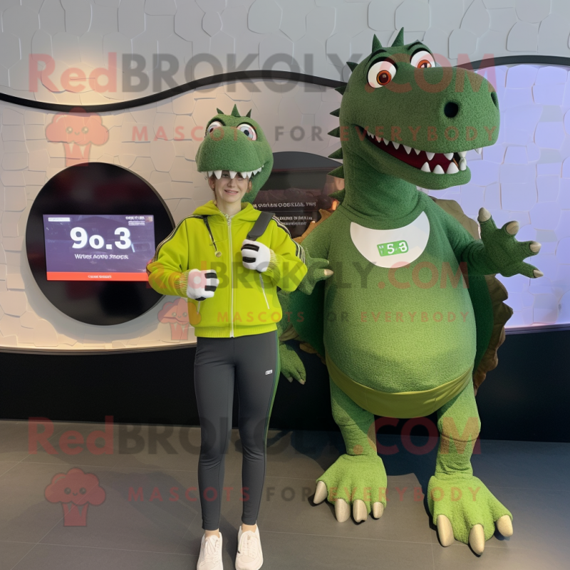 Olive Spinosaurus mascot costume character dressed with a Sweatshirt and Smartwatches