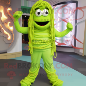 Lime Green Spaghetti mascot costume character dressed with a Overalls and Shoe laces