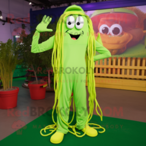 Lime Green Spaghetti mascot costume character dressed with a Overalls and Shoe laces