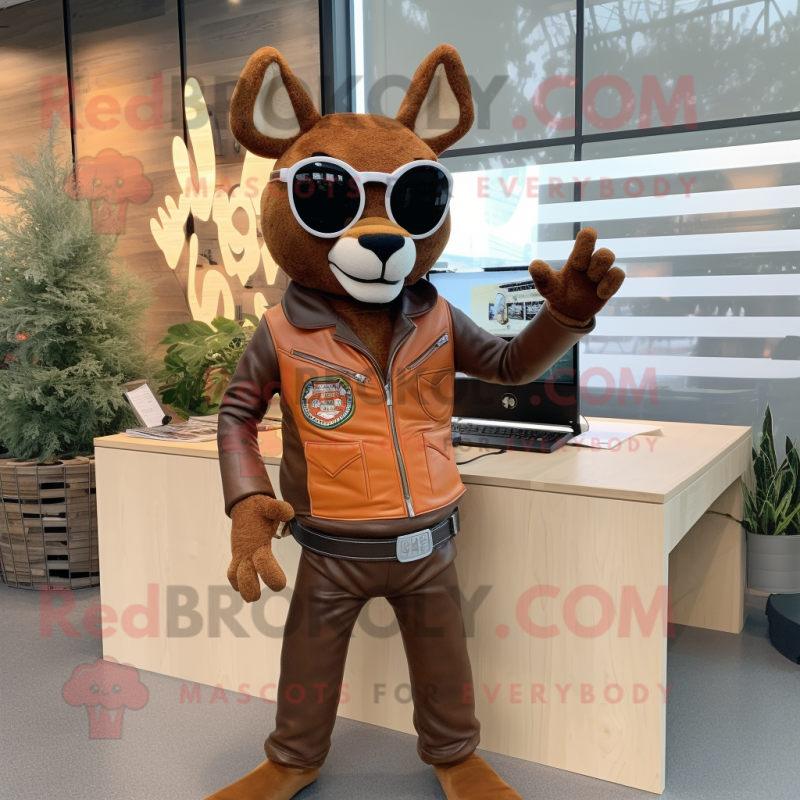 Rust Deer mascot costume character dressed with a Moto Jacket and Reading glasses Rust Deer mascot costume character dressed with a Moto Jacket and Reading glasses