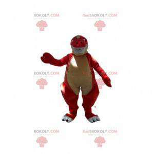 Mascote de dinossauro vermelho de aparência feroz, fantasia de