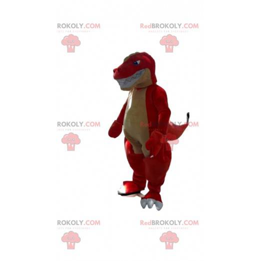 Mascote de dinossauro vermelho de aparência feroz, fantasia de