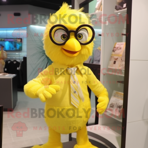 Lemon Yellow Archeopteryx mascot costume character dressed with a Button-Up Shirt and Eyeglasses