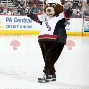 Mascotte d'ours marron en tenue de hockey - Redbrokoly.com