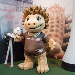 Tan Ankylosaurus mascot costume character dressed with a Rugby Shirt and Hair clips