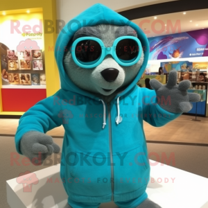 Turquoise Mongoose mascot costume character dressed with a Sweatshirt and Eyeglasses