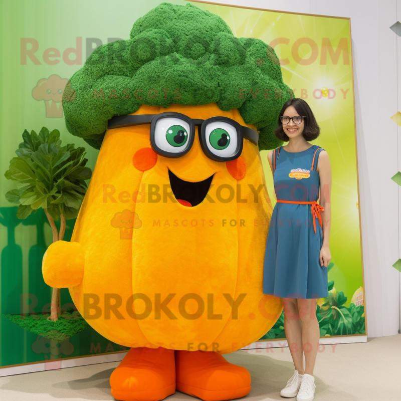 Orange Broccoli mascot costume character dressed with a Shift Dress and Eyeglasses Orange Broccoli mascot costume character dressed with a Shift Dress and Eyeglasses