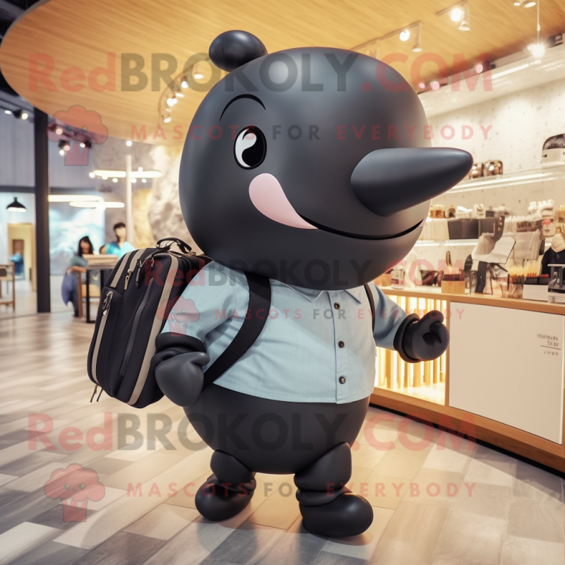Black Whale mascot costume character dressed with a Chinos and Handbags Black Whale mascot costume character dressed with a Chinos and Handbags