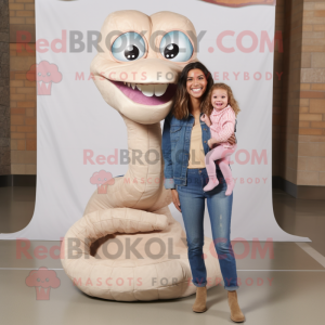 Beige Snake mascot costume character dressed with a Mom Jeans and Rings