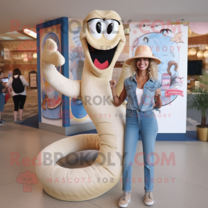 Beige Snake mascot costume character dressed with a Mom Jeans and Rings