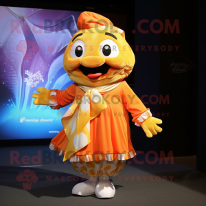 Gold Clown Fish mascot costume character dressed with a Bermuda Shorts and Shawl pins