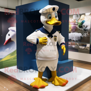 Navy Gosling mascot costume character dressed with a Rash Guard and Foot pads