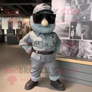 Gray Commando mascot costume character dressed with a Denim Shorts and Sunglasses