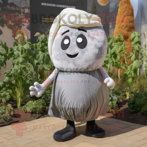 Silver Turnip mascot costume character dressed with a Dungarees and Scarf clips