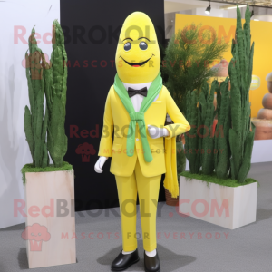 Lemon Yellow Asparagus mascot costume character dressed with a Blazer and Scarf clips