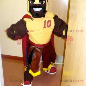 African gladiator mascot with yellow armor - Redbrokoly.com