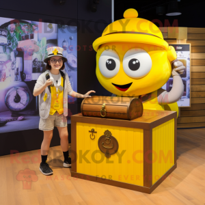 Yellow Treasure Chest mascot costume character dressed with a Oxford Shirt and Digital watches