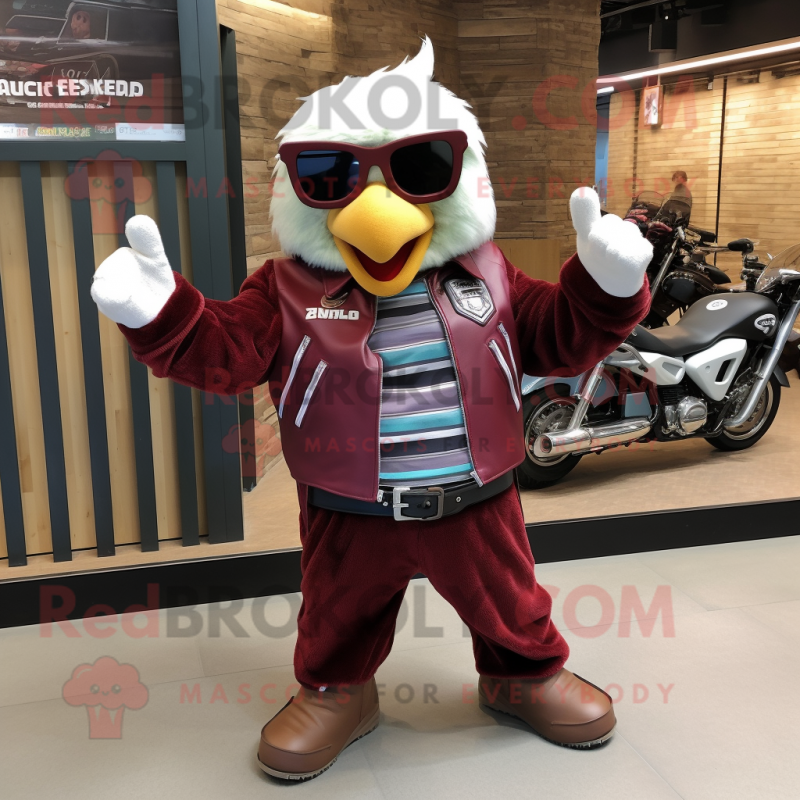 Maroon Shakshuka mascot costume character dressed with a Biker Jacket and Gloves Maroon Shakshuka mascot costume character dressed with a Biker Jacket and Gloves