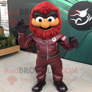 Maroon Shakshuka mascot costume character dressed with a Biker Jacket and Gloves