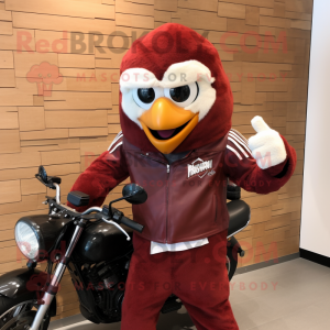 Maroon Shakshuka mascot costume character dressed with a Biker Jacket and Gloves