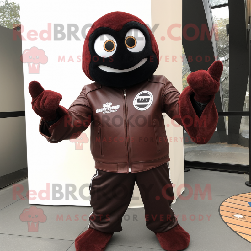 Maroon Shakshuka mascot costume character dressed with a Biker Jacket and Gloves Maroon Shakshuka mascot costume character dressed with a Biker Jacket and Gloves