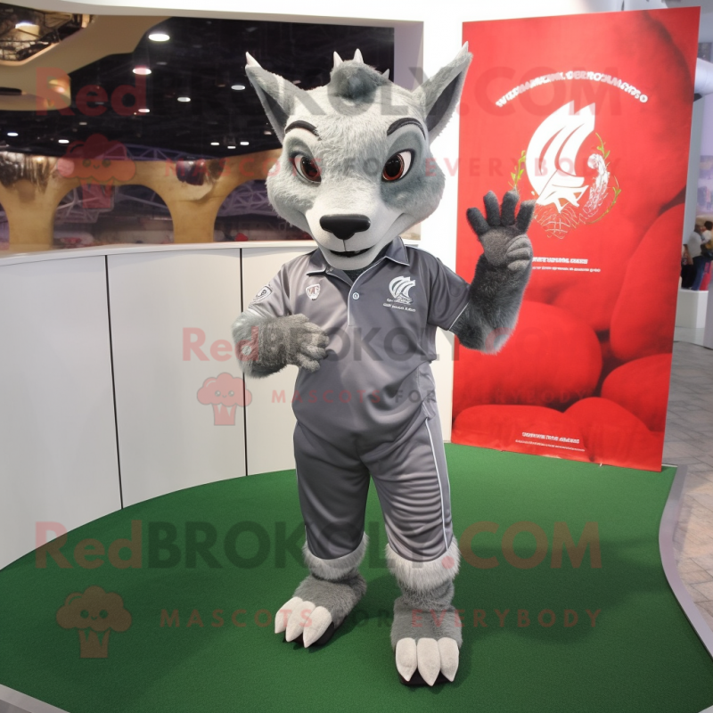 Silver Chupacabra mascot costume character dressed with a Polo Tee and Headbands Silver Chupacabra mascot costume character dressed with a Polo Tee and Headbands