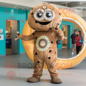 Brown Bagels mascot costume character dressed with a Romper and Rings