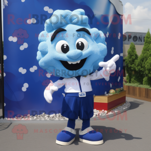 Blue Pop Corn mascot costume character dressed with a Cargo Shorts and Cufflinks
