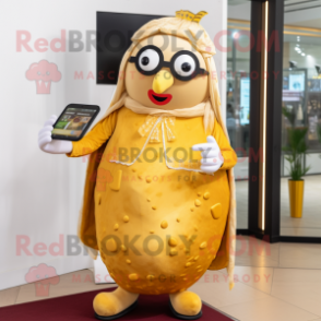 Gold Shakshuka mascot costume character dressed with a Dress and Eyeglasses