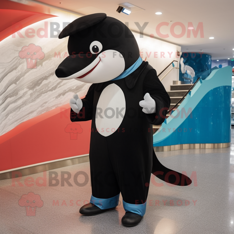 nan Killer Whale mascot costume character dressed with a Suit and Shawls