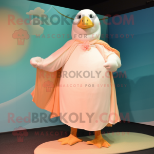 Peach Albatross mascot costume character dressed with a A-Line Dress and Shawl pins