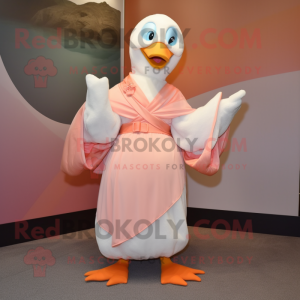 Peach Albatross mascot costume character dressed with a A-Line Dress and Shawl pins