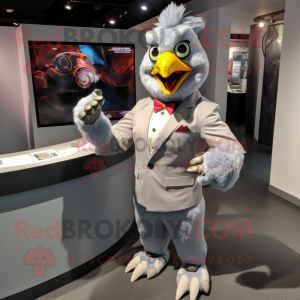 Gray Tandoori Chicken mascot costume character dressed with a Suit and Bracelet watches