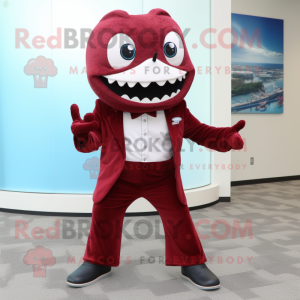 Maroon Barracuda mascot costume character dressed with a Suit Pants and Shoe clips