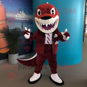 Maroon Barracuda mascot costume character dressed with a Suit Pants and Shoe clips