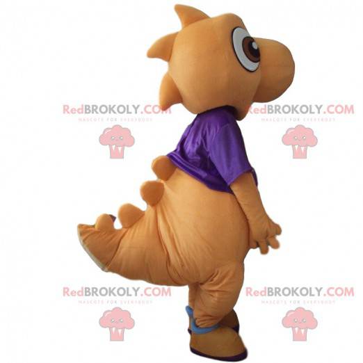Orange and white dinosaur mascot, colorful dragon costume -