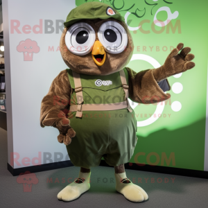 Olive Owl mascot costume character dressed with a Overalls and Rings