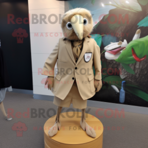 Beige Kiwi mascot costume character dressed with a Blazer and Shoe clips