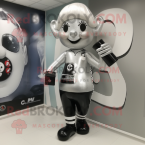 Silver Guinness mascot costume character dressed with a Leggings and Handbags