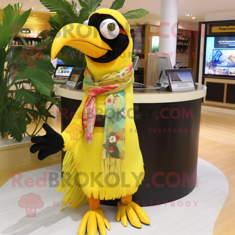 Yellow Toucan mascot costume character dressed with a Wrap Skirt and Scarves Yellow Toucan mascot costume character dressed with a Wrap Skirt and Scarves