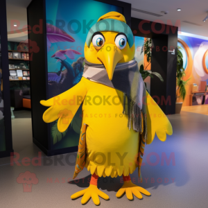 Yellow Toucan mascot costume character dressed with a Wrap Skirt and Scarves