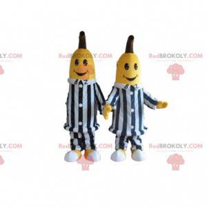 2 mascotes banana em roupas listradas em preto e branco -