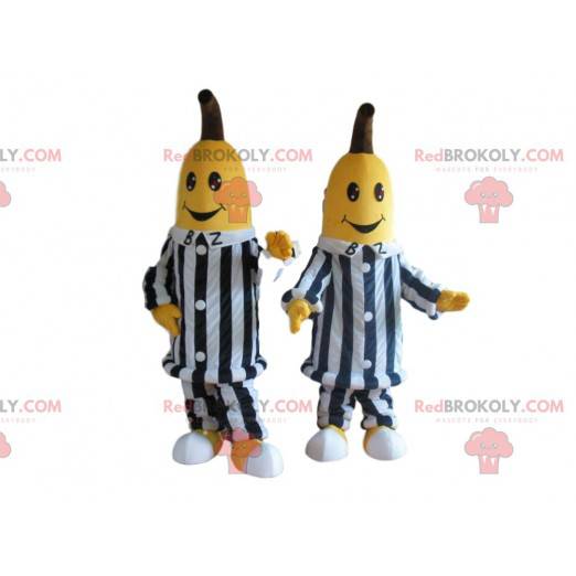 2 mascotes banana em roupas listradas em preto e branco -
