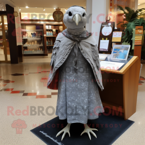 Gray Quail mascot costume character dressed with a Sheath Dress and Shawl pins