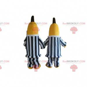 2 banana mascots in black and white striped clothes -