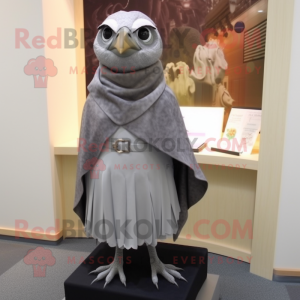 Gray Quail mascot costume character dressed with a Sheath Dress and Shawl pins