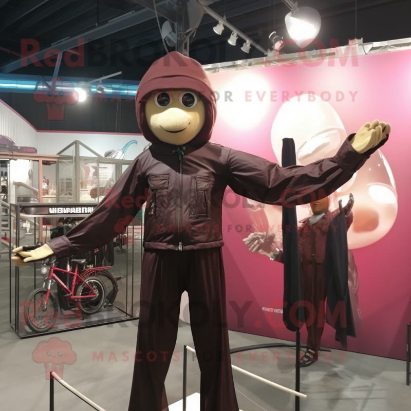 Maroon Trapeze Artist mascot costume character dressed with a Leather Jacket and Cummerbunds Maroon Trapeze Artist mascot costume character dressed with a Leather Jacket and Cummerbunds