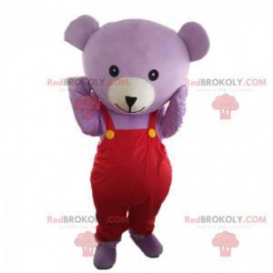 Mascotte d'ourson mauve avec une salopette, costume de nounours