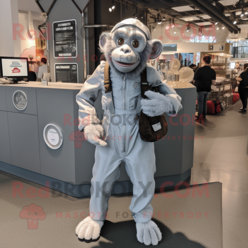 Silver Chimpanzee mascot costume character dressed with a Overalls and Handbags Silver Chimpanzee mascot costume character dressed with a Overalls and Handbags