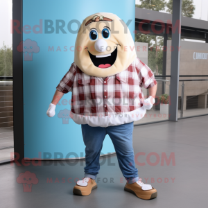 Cream Donut mascot costume character dressed with a Flannel Shirt and Shoe laces
